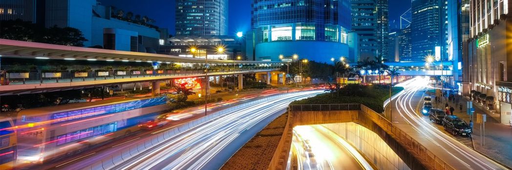 Light currents on a busy road, which represent the optimal flow of goods.