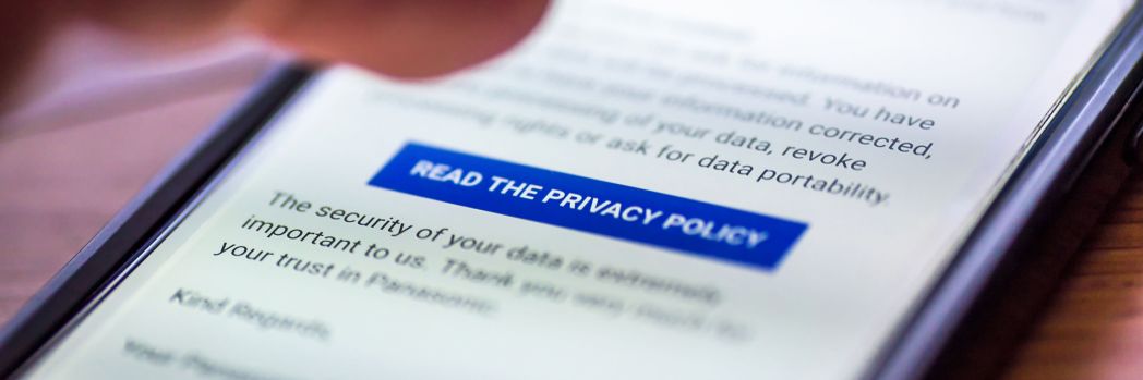 A picture of a smartphone can be seen in the foreground.