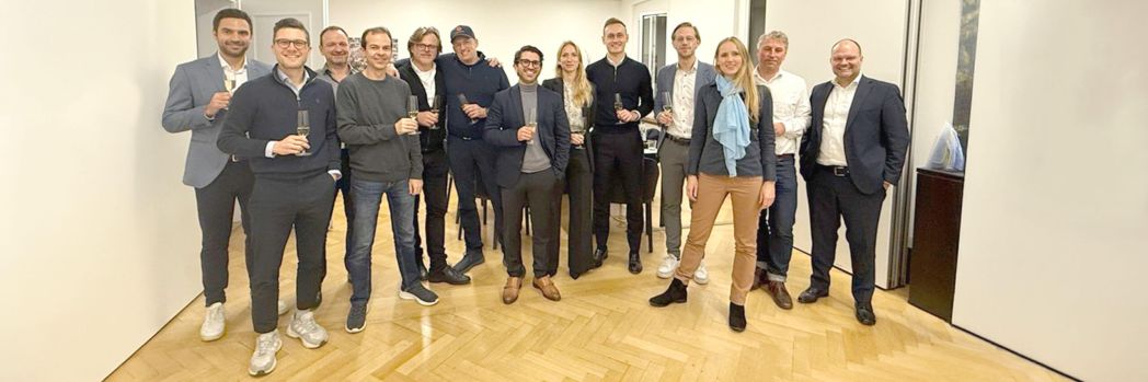 Team photo: Participants from EIKONA Logistics, Schäflein AG, Main Capital Partners, and lawyers at the majority stake transaction."
