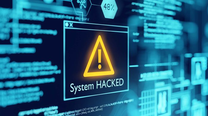 Warnung über ein gehacktes System auf Monitor eines Logistikers